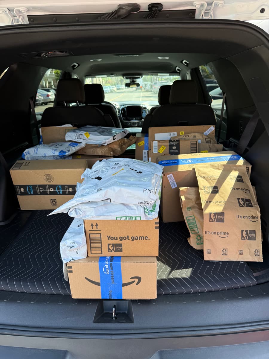 Boxes and envelopes arranged in a vehicle for delivery