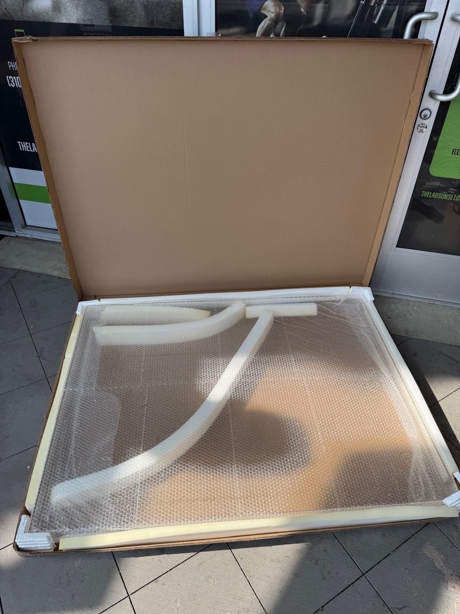 Large custom item protected with foam and bubble wrap