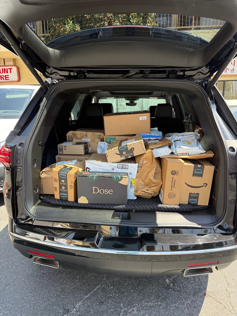 Vehicle cargo area filled with an organized package route